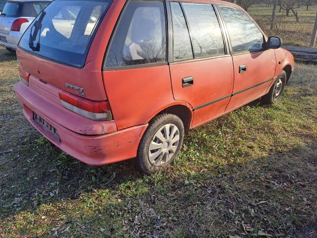 bontott SUZUKI SWIFT II Jobb első Dobbetét (Kerékjárati, Műanyag)