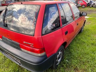 bontott SUZUKI SWIFT II Jobb első Dobbetét (Kerékjárati, Műanyag)