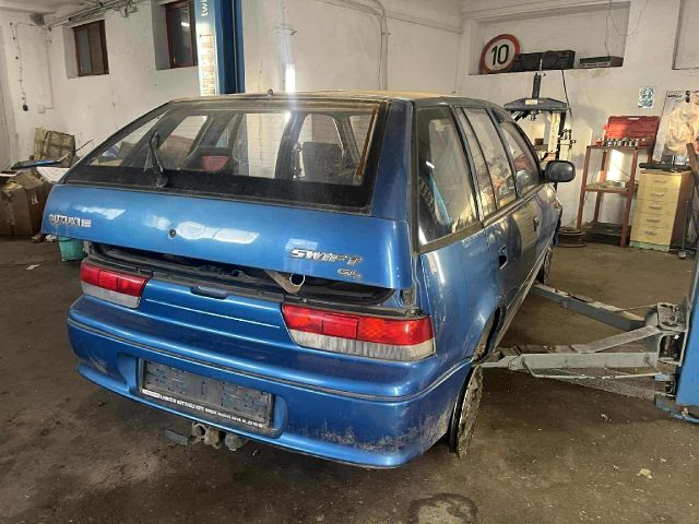 bontott SUZUKI SWIFT II Jobb első Gumikéder