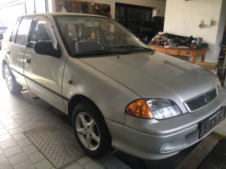 bontott SUZUKI SWIFT II Jobb első Kilincs Bowden