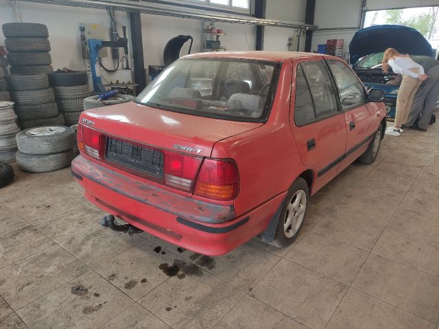 bontott SUZUKI SWIFT II Jobb első Sárvédő Gumi