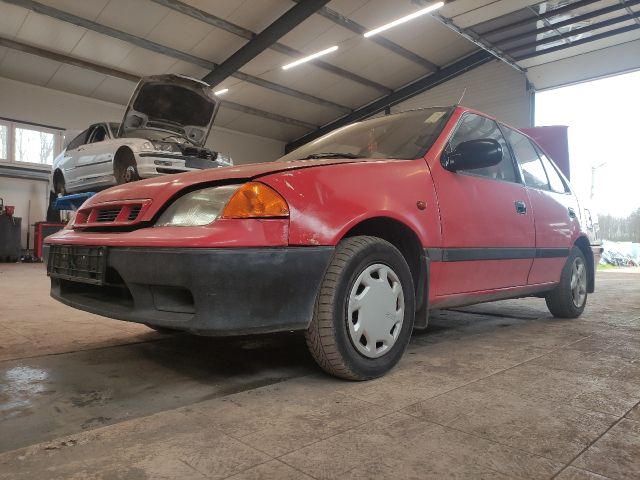 bontott SUZUKI SWIFT II Jobb első Sárvédő Gumi