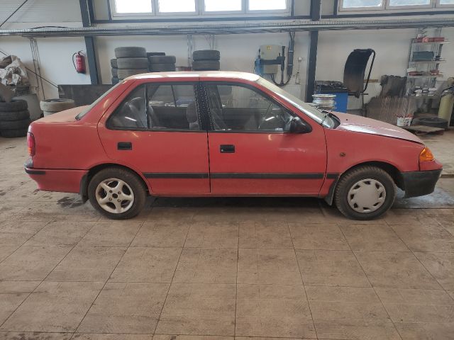 bontott SUZUKI SWIFT II Jobb első Sárvédő Gumi