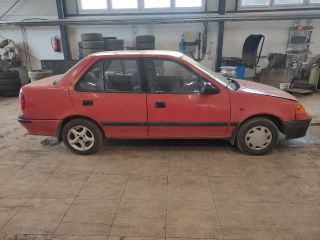 bontott SUZUKI SWIFT II Jobb első Sárvédő Gumi