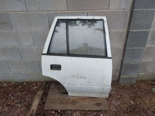 bontott SUZUKI SWIFT II Jobb hátsó Ajtó (Részeivel)