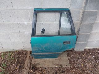 bontott SUZUKI SWIFT II Jobb hátsó Ajtó (Részeivel)