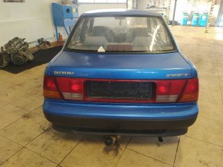 bontott SUZUKI SWIFT II Jobb hátsó Gumikéder