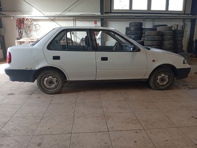 bontott SUZUKI SWIFT II Jobb hátsó Külső Kilincs