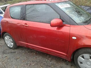 bontott SUZUKI SWIFT III Bal első Rugó