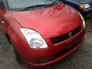 bontott SUZUKI SWIFT III Bal első Rugó