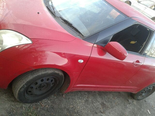 bontott SUZUKI SWIFT III Bal első Rugó