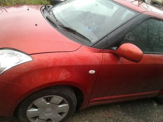 bontott SUZUKI SWIFT III Bal első Rugó