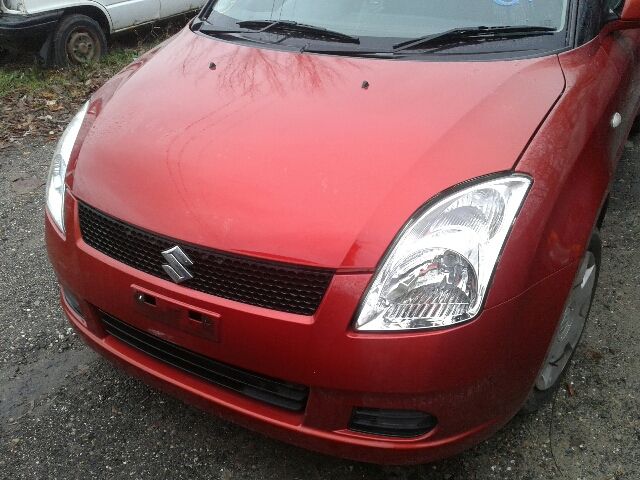 bontott SUZUKI SWIFT III Bal első Rugó