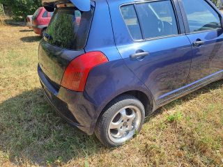 bontott SUZUKI SWIFT III Jobb hátsó Rugó