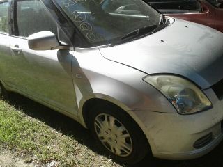 bontott SUZUKI SWIFT III Jobb hátsó Rugó