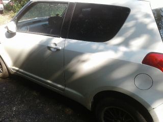 bontott SUZUKI SWIFT III Jobb hátsó Rugó