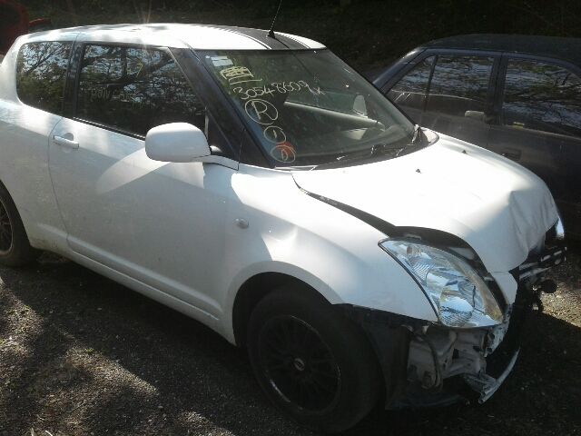 bontott SUZUKI SWIFT III Jobb hátsó Rugó