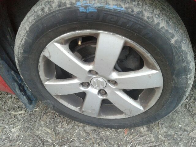 bontott SUZUKI SWIFT III Bal első Rugó