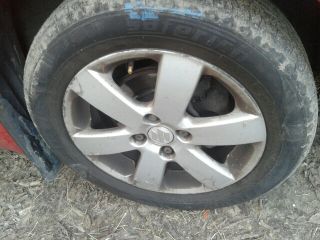 bontott SUZUKI SWIFT III Bal első Rugó