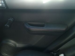 bontott SUZUKI SWIFT III Bal első Rugó