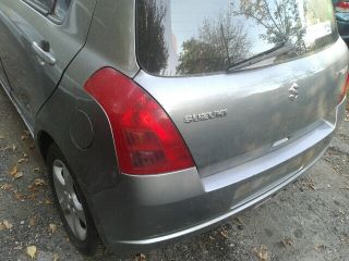 bontott SUZUKI SWIFT III Bal első Rugó