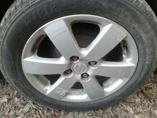 bontott SUZUKI SWIFT III Bal első Rugó