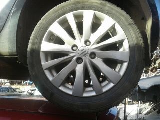 bontott SUZUKI SWIFT III Bal első Rugó