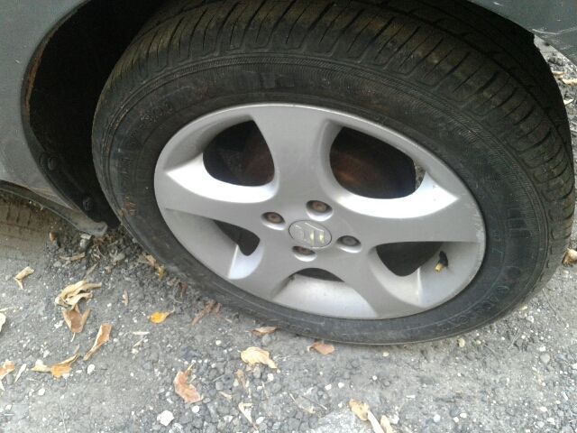 bontott SUZUKI SWIFT III Bal első Rugó