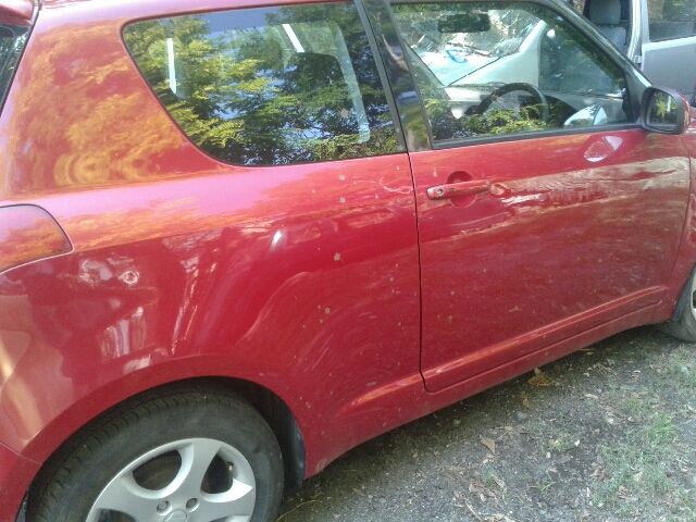 bontott SUZUKI SWIFT III Bal első Rugó