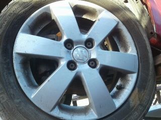 bontott SUZUKI SWIFT III Bal első Rugó