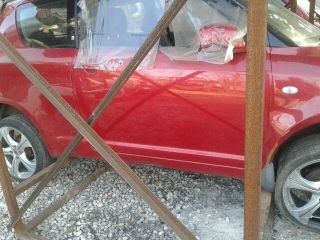 bontott SUZUKI SWIFT III Bal első Rugó