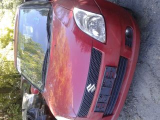 bontott SUZUKI SWIFT III Bal hátsó Rugó