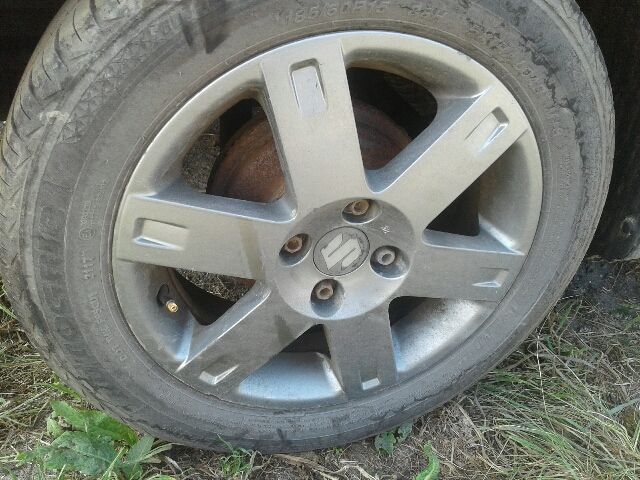 bontott SUZUKI SWIFT III Bal hátsó Rugó