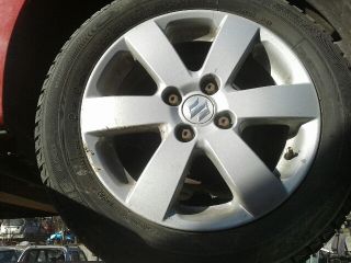 bontott SUZUKI SWIFT III Jobb hátsó Rugó