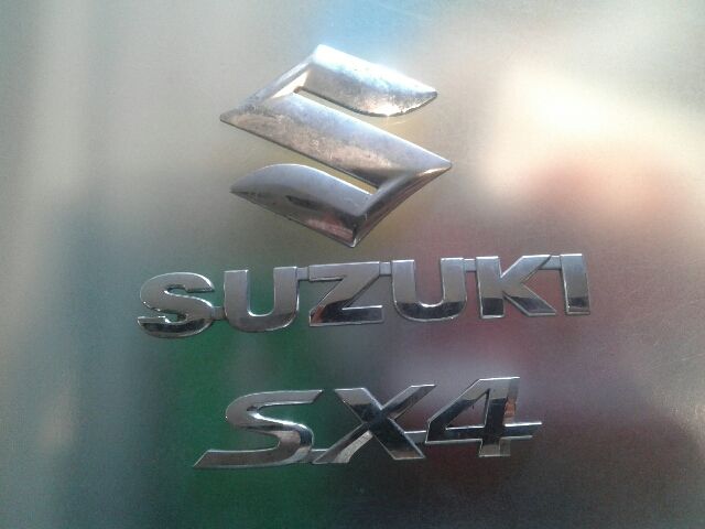 bontott SUZUKI SWIFT III Hátsó Embléma
