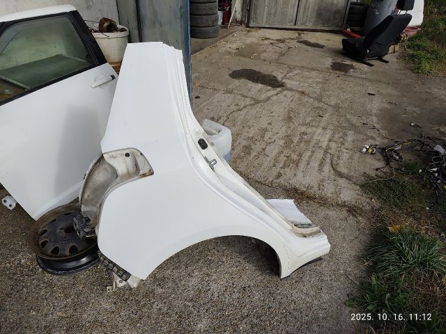 bontott SUZUKI SWIFT III Jobb hátsó Sárvédő