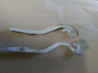 bontott SUZUKI SWIFT III Motorháztető Zsanér Pár