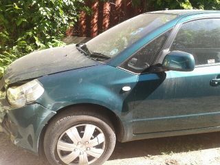 bontott SUZUKI SX4 Bal hátsó Rugó