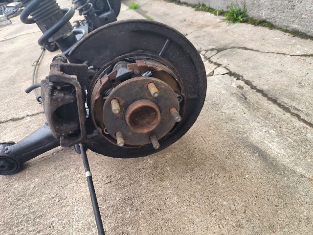 bontott TOYOTA COROLLA VERSO Bal hátsó Féknyereg Munkahengerrel