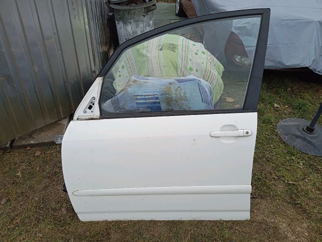 bontott TOYOTA COROLLA VERSO Bal első Ajtó (Részeivel)