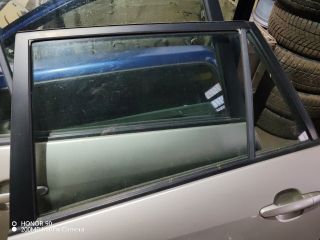 bontott TOYOTA COROLLA VERSO Bal hátsó Ajtó (Részeivel)