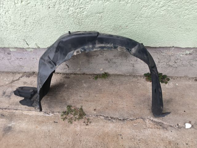 bontott TOYOTA YARIS Bal első Első Dobbetét (Kerékjárati, Műanyag)