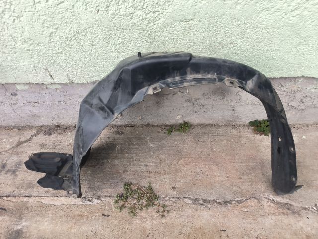 bontott TOYOTA YARIS Bal első Első Dobbetét (Kerékjárati, Műanyag)