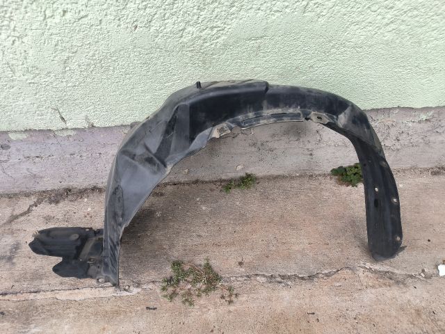 bontott TOYOTA YARIS Bal első Első Dobbetét (Kerékjárati, Műanyag)