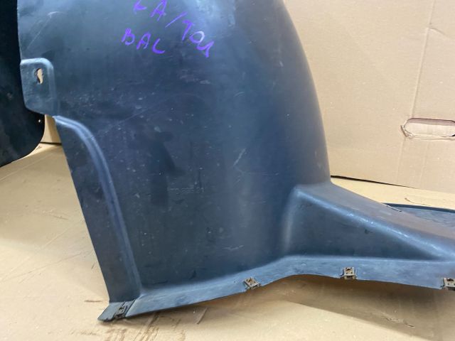 bontott VW CADDY Bal első Dobbetét (Kerékjárati, Műanyag)