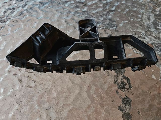 bontott VW CADDY Bal első Lökhárító Tartó (Műanyag)