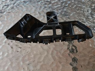 bontott VW CADDY Bal első Lökhárító Tartó (Műanyag)