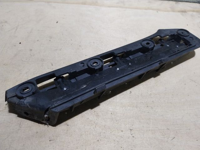 bontott VW CADDY Bal első Lökhárító Tartó (Műanyag)