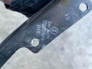 bontott VW CADDY Bal Fényszóró Tartó