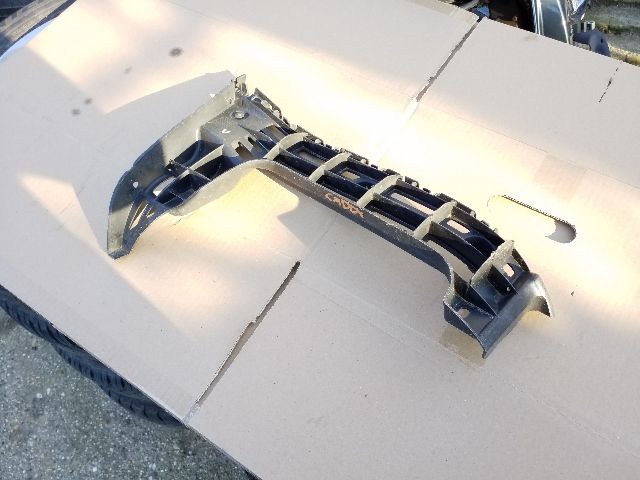 bontott VW CADDY Bal hátsó Lökhárító Tartó (Műanyag)